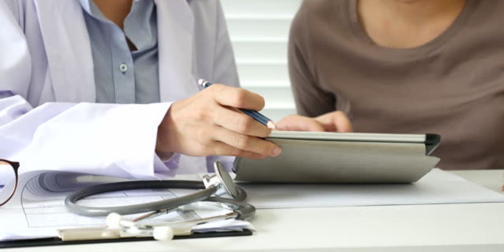 doctor consulting patient in a German clinic